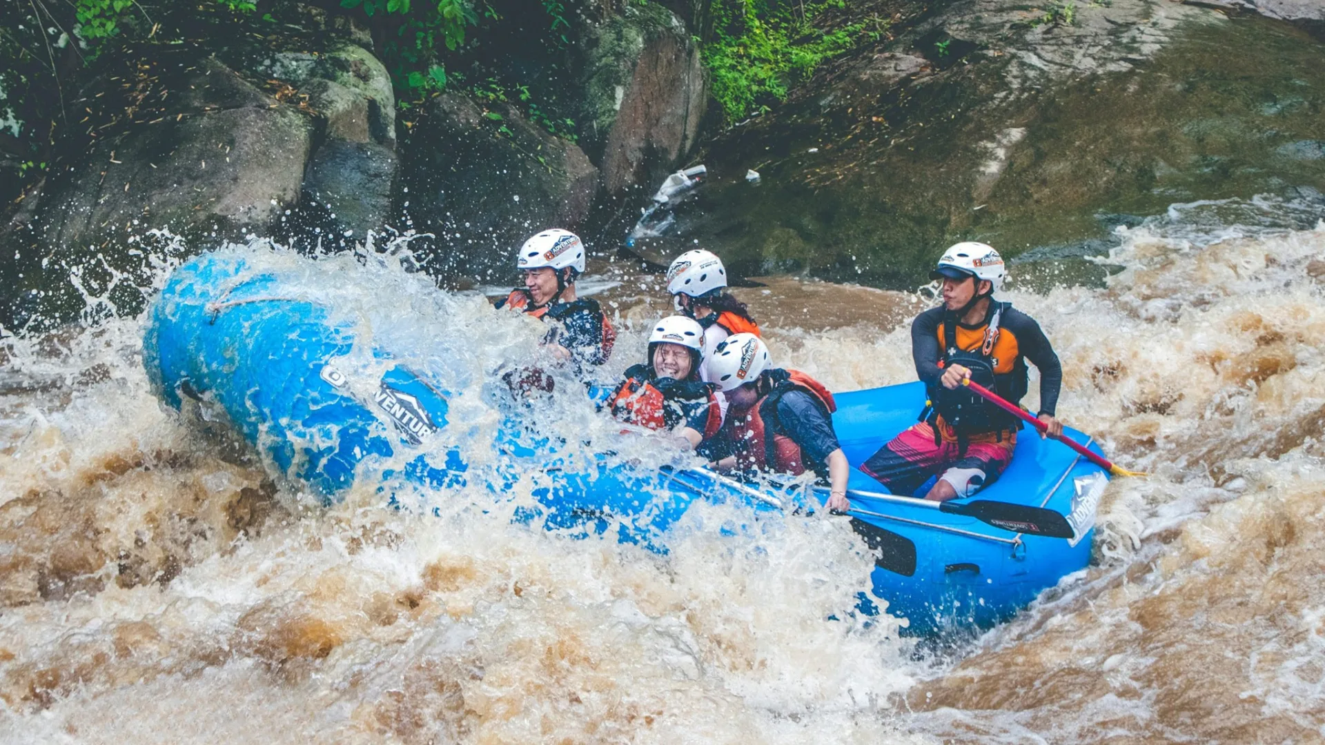 ATV quad-biking on an off-road forest track at the Mae Taeng basecamp