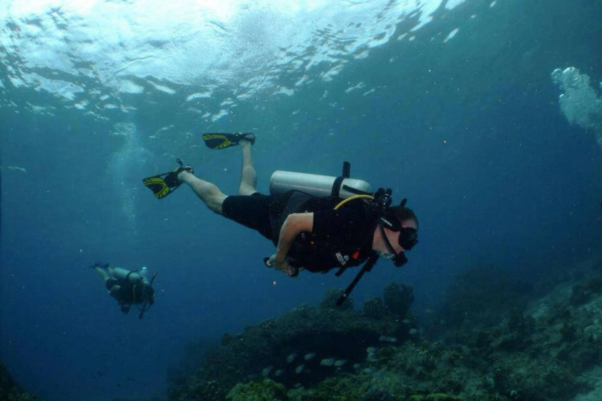 Snorkelling in the clear water at Banana Beach, Coral Island