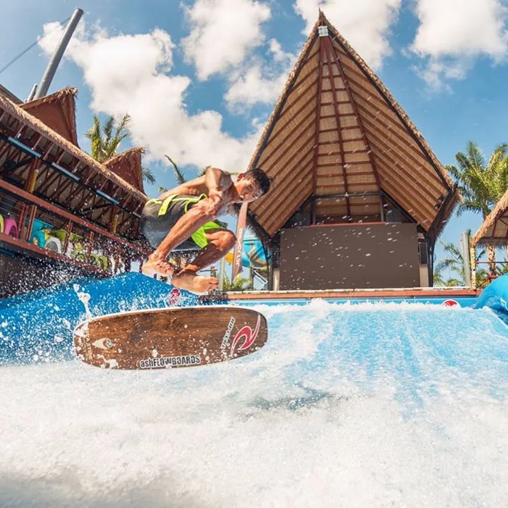 Guest surfing the FlowRider in the Surf's Up zone at Columbia Pictures Aquaverse