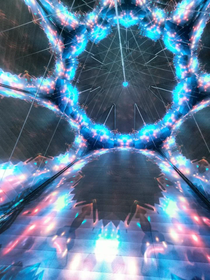 Mirrored tunnel with light projections inside Space & Time Cube+